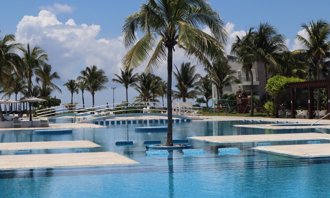 Puerto Juarez Apartment | Relax in Playa del Carmen: Ocean View with Pool & Spa