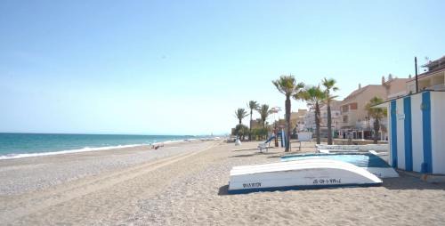 San Luis de Sabinillas Apartment | Oceanfront Getaway at Playa Sun – Rated 8.6/10