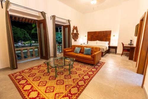 Lourdes Hotel | Relax at Plaza Chapala Hotel with Hot Tub & Family Amenities