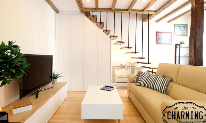 Sol Apartment | Top-Rated Plaza Mayor Duplex with Kitchen & Spa Access