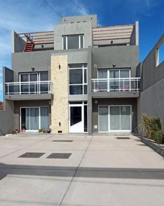 Puerto Rawson Apartment | Family-Friendly Retreat at Plus Playa Unión - Rated 9.5/10