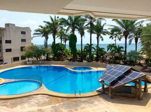Noen Phra Resort | PMY Beach Resort: Oceanfront Getaway with Hot Tub & Pool