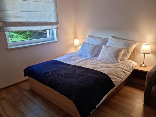 Choczewo Apartment | Top-Rated Pod Cisem: Family-Friendly with Cozy Hot Tub