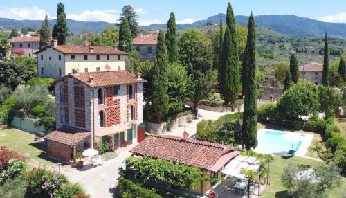 San Michele di Moriano Apartment | Experience Podere Farinello: Poolside Oceanfront Retreat