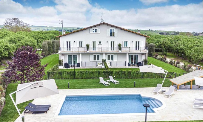 Capranica Apartment | Relaxing Suite Senior SX with Pool and Hot Tub Amenities