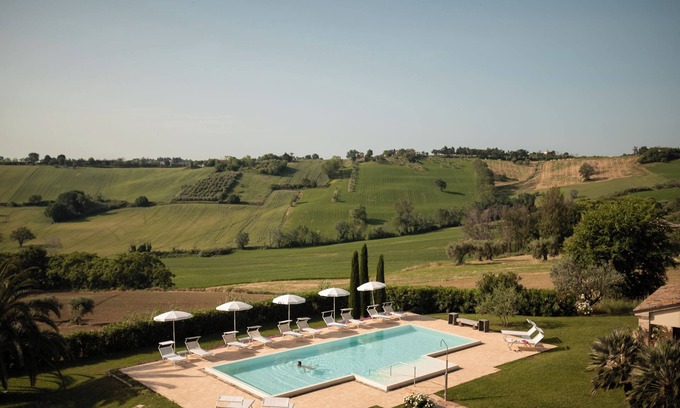 Monte San Vito House | Poggio Antico - Suites with Breakfast and Great Amenities