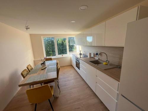 Klaipeda District Municipality Apartment | Discover Poilsis Drevernoje: Family-Friendly Retreat