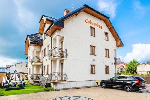 Karwia House | Cozy Pokoje Goscinne Columbus: Pet-Friendly Retreat