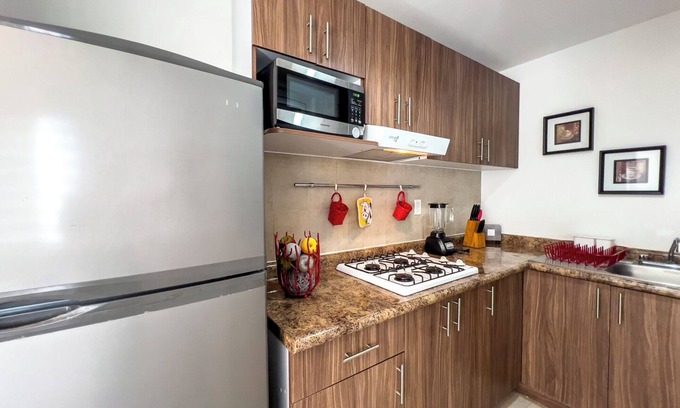 Leon Apartment | Poliforum Modern 2BR Modern Apartment