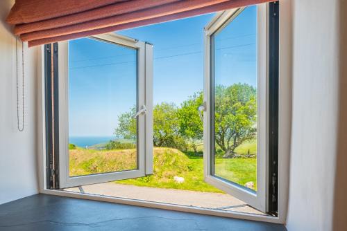 Boscastle House | Seaberry Cottage at Polrunny Farm: Pet-Friendly Retreat