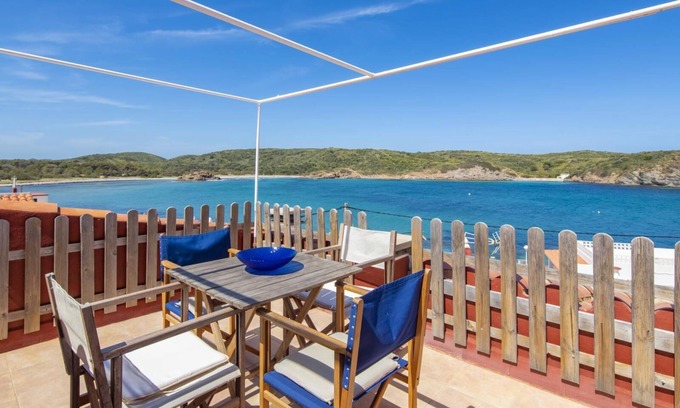 Es Grau Apartment | Ponent-Beachfront Apartment: Relaxing Coastal Retreat Awaits