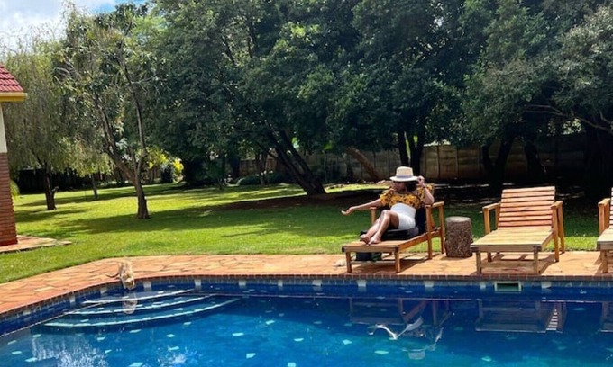 Harare Cottage | Pool Cottage at No. 105 by Ekhaya