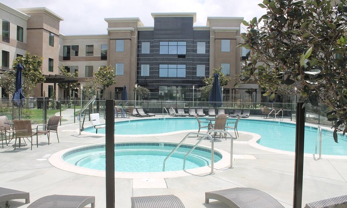 Bressi Ranch Apartment | Relaxing Getaway with Pool, Hot Tub & Free Breakfast!
