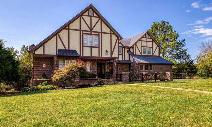 Sevierville House | Relax by the Pool at Tudor Rose Lodge - Family Friendly Stay!