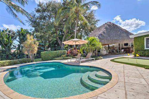 Florida North Atlantic Coast House | Exquisite Tropical Palm Beach Retreat with Pool & Spa