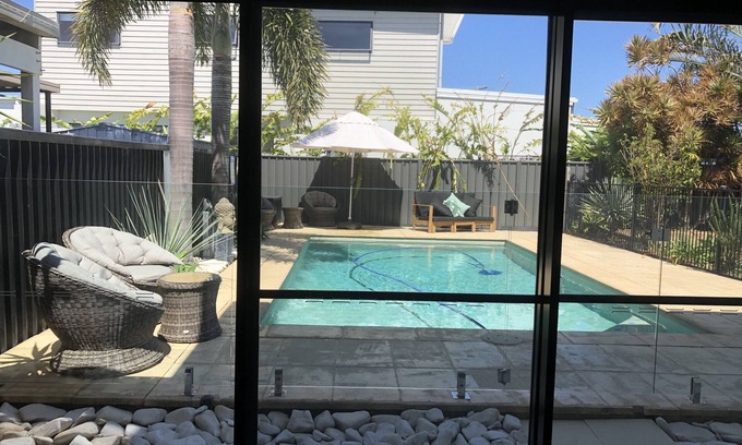 Buddina Apartment | Poolside Retreat: Walk to the Beach with Ocean Views