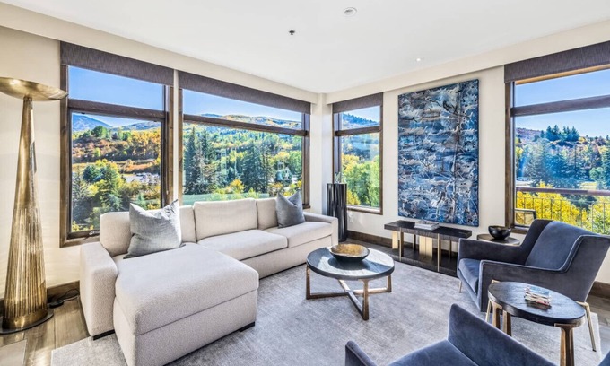 Avon Condo | Guest Rated 10/10: Pop Art Riverfront Ski Retreat with Pool