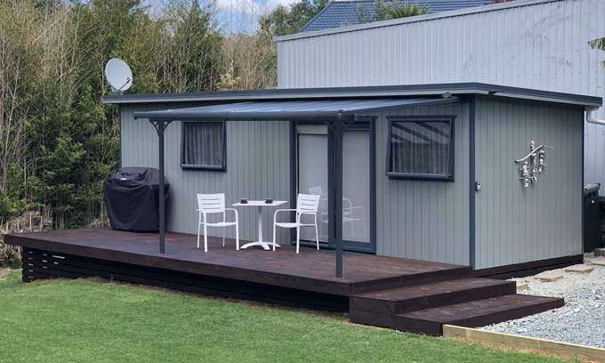 Whangarei Heads Cabin | Discover Urquharts Bay: Beach Cabin with Private Garden