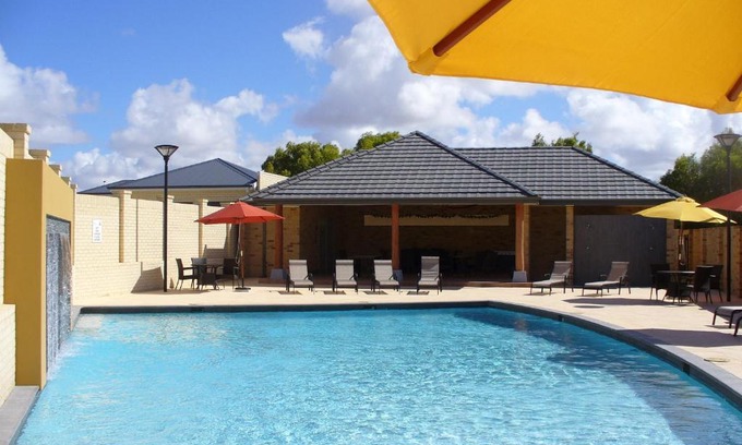 Port Denison Apartment | Beachfront Bliss at Port Denison Beach Resort – 4 Star Gem