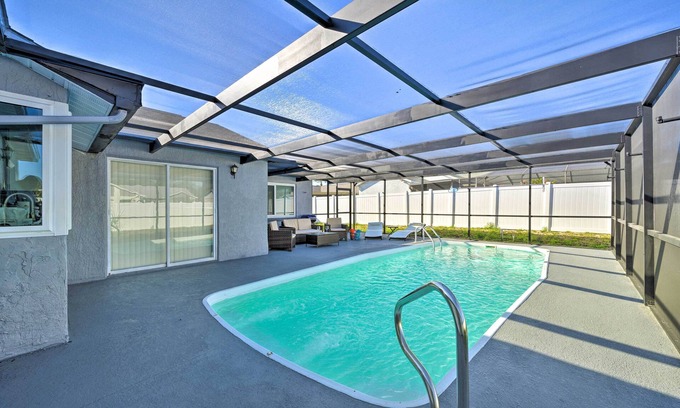 Orchid Lake Village House | Relaxing Port Richey Getaway with Pool and Grill Access