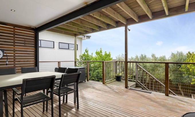 Portarlington House | Port Views Holiday Home with Oceanfront Pool Access