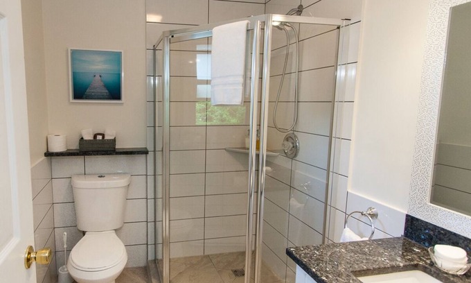 Wolfville Bed & Breakfast | Downtown Port Williams Room with King Bed and Patio Access