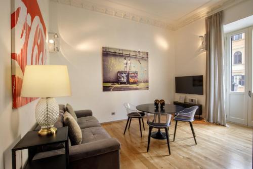 Rione XIV Borgo Apartment | Discover Porta Castello: 4-Star Family-Friendly Retreat
