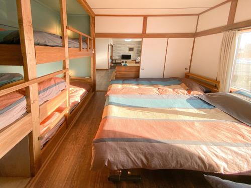 Shiraoi-cho House | Discover PortFront: Family-Friendly Retreat with Hot Tub