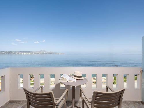 Kalyves Apartment | Discover Porto Kalyves Seaside Aparthotel: Oceanfront Bliss
