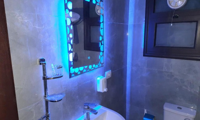 Al-Manasrah Apartment | Discover Porto Said: 4-Star Retreat with Private Beach & Pool