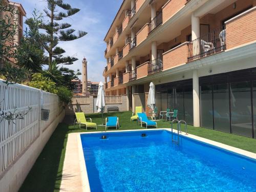 Canet de Berenguer Apartment | Oceanfront Retreat at Portocanet Complejo Turístico