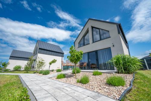Darlowo House | Experience Porzeczkowe Domki: Pet-Friendly Family Retreat