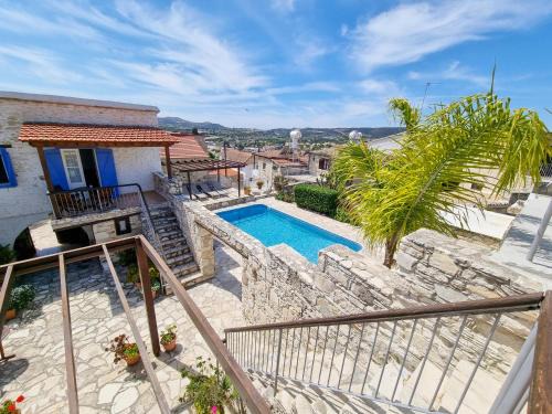 Skarinou Apartment | Experience Poseidon's Pool Paradise with Oceanfront Views
