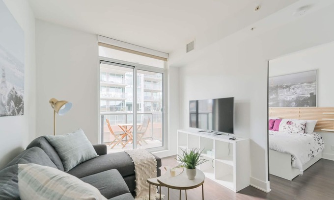 East Village Condo | Elegant 2BR Condo with Spa near Stampede & Parking