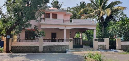 Courtallam House | Cozy Pothigai Cottage: Family-Friendly with Pool Access