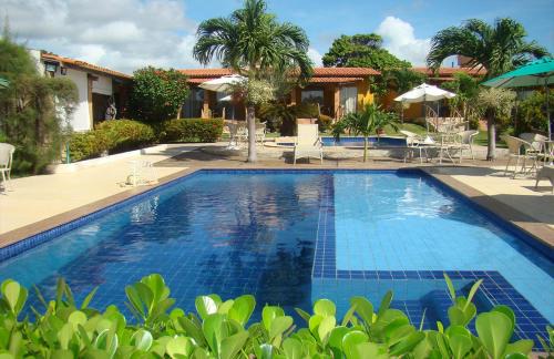 Pitimbu Hotel | Discover Pousada Aconchego: Ocean View & Pool Access