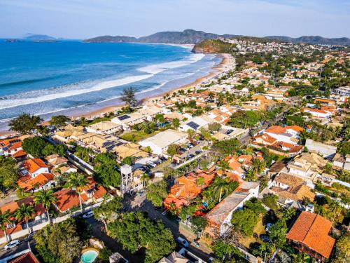 Manguinhos Hotel | Relax at Pousada Alforria: Pool, Restaurant & Family Fun