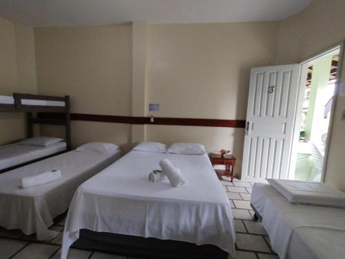 Sao Domingos Hotel | Inviting Pousada Arco Iris Ilhéus with Pool & Family Fun
