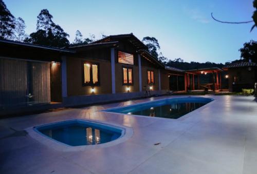Conceicao do Mato Dentro House | Experience Pousada Paudoro: Top-Rated Stay with Pool & Hot Tub