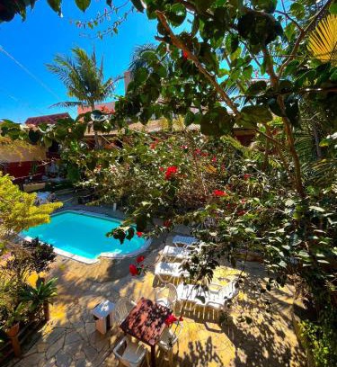 Praia do Rosa Hotel | Cozy Pousada Chaday: Pool, Spa & Family-Friendly Comfort