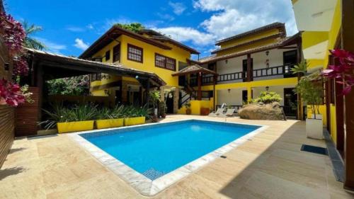 Portal das Artes Hotel | Discover Pousada Cicerone: Family-Friendly with Pool Access