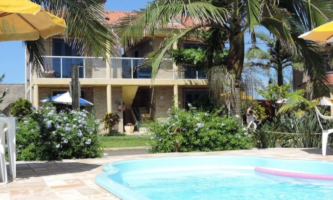Torres Hotel | Inviting Pousada Don Fernandes: Pool and Family-Friendly Stay