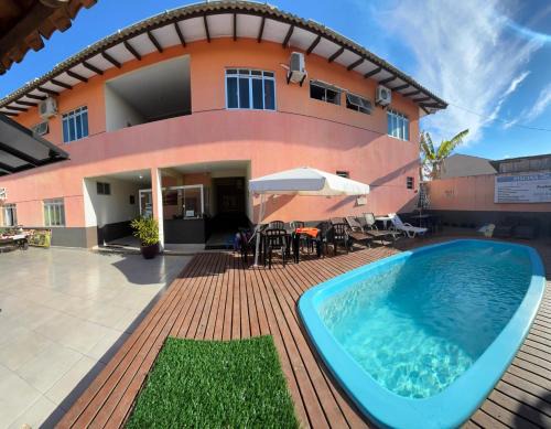 Praia de Leste House | Oceanfront Retreat at Pousada Fênix with Pool & Dining