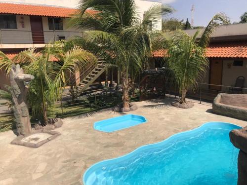 Olimpia Hotel | Discover Pousada Facincani: Family-Friendly with Pool & Breakfast