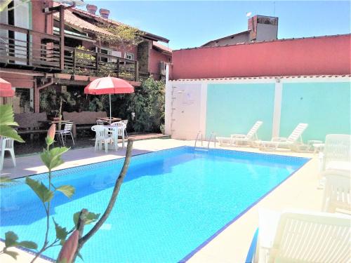 Juquehy Hotel | Family-Friendly Pousada Irashai with Pool and Ocean Views