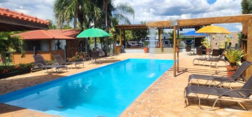 Delfinopolis Hotel | Pet-Friendly Pousada Lago Azul: Ocean Views & Poolside Comfort