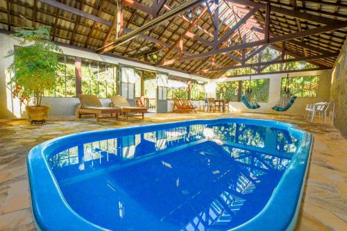 Monte Verde Hotel | Discover Pousada Lago Azul: Rated 10/10 with Pool & Spa