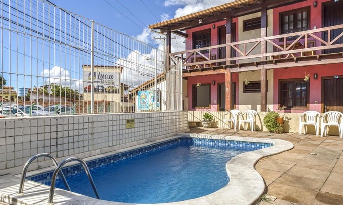 Puerto Seguro Center Hotel | Pet-Friendly Pousada Lago De Garda with Pool & Family Fun