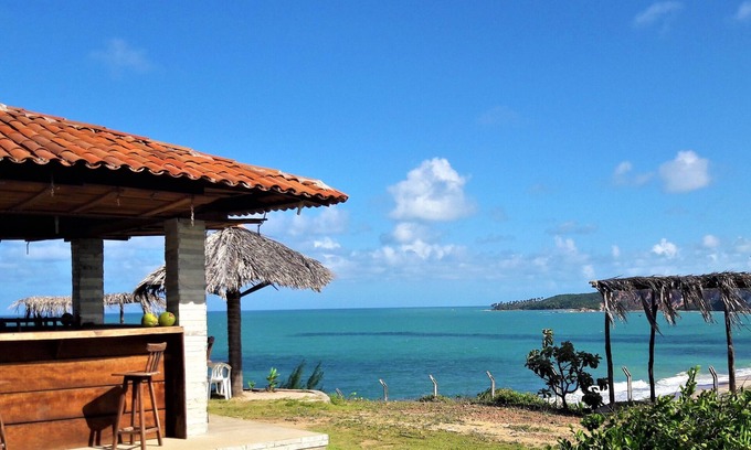 Conde Hotel | Discover Pousada Laguna: Ocean Views & Poolside Relaxation