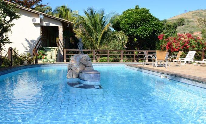 Castelo Hotel | Discover Pousada Lua e Sol: Pet-Friendly Retreat with Pool